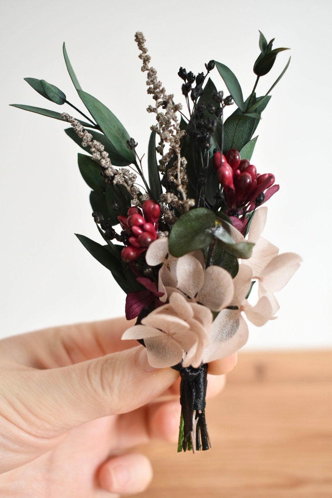 Red, plum and nude boutonniere
