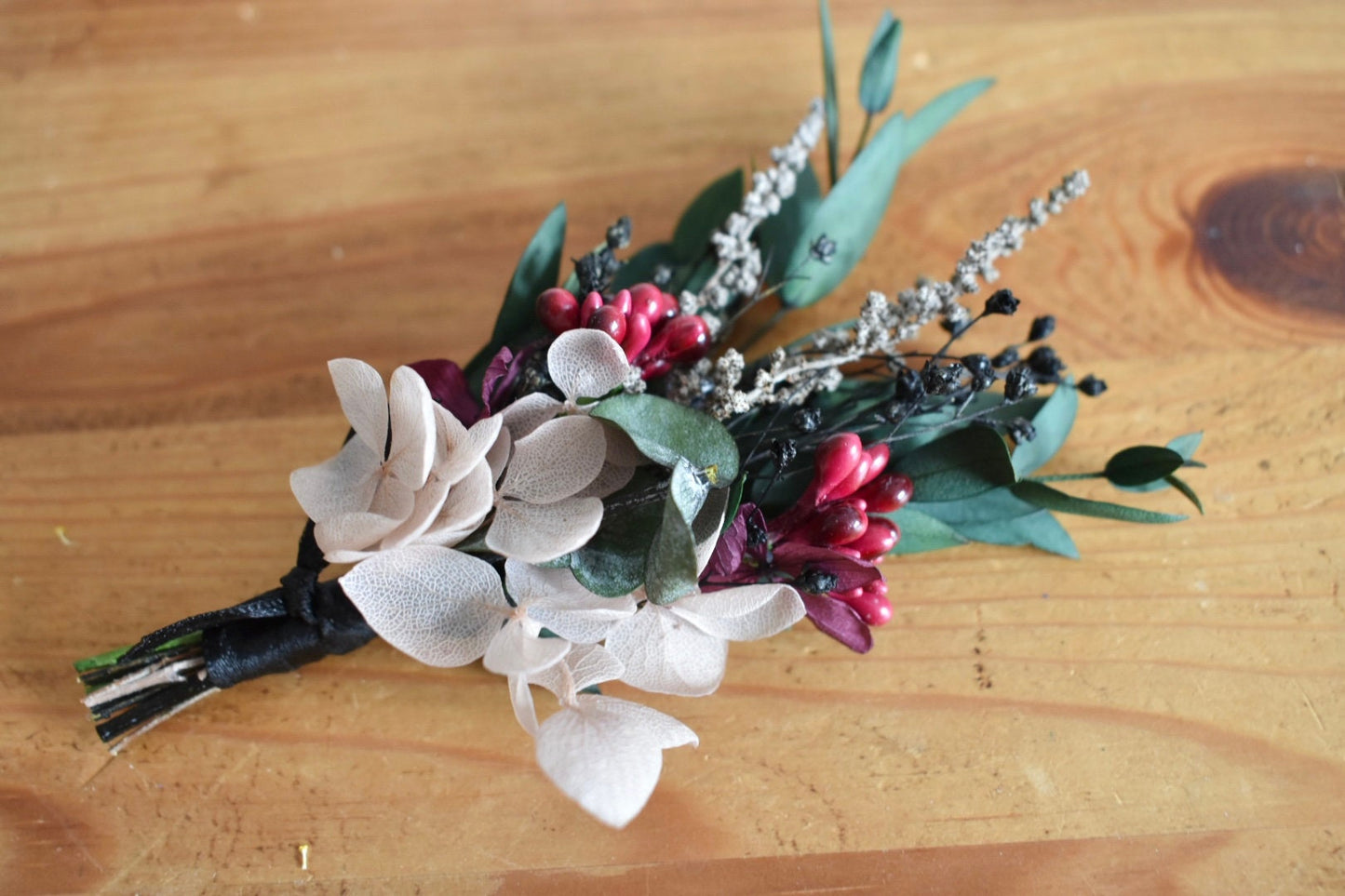 Red, plum and nude boutonniere