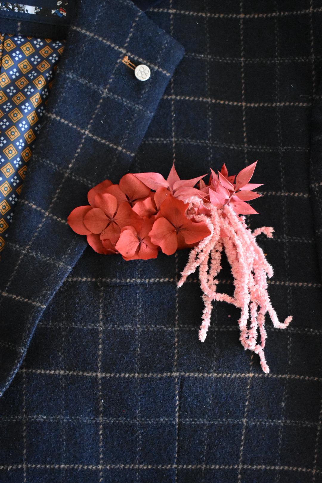 Red and pink pocket boutonniere