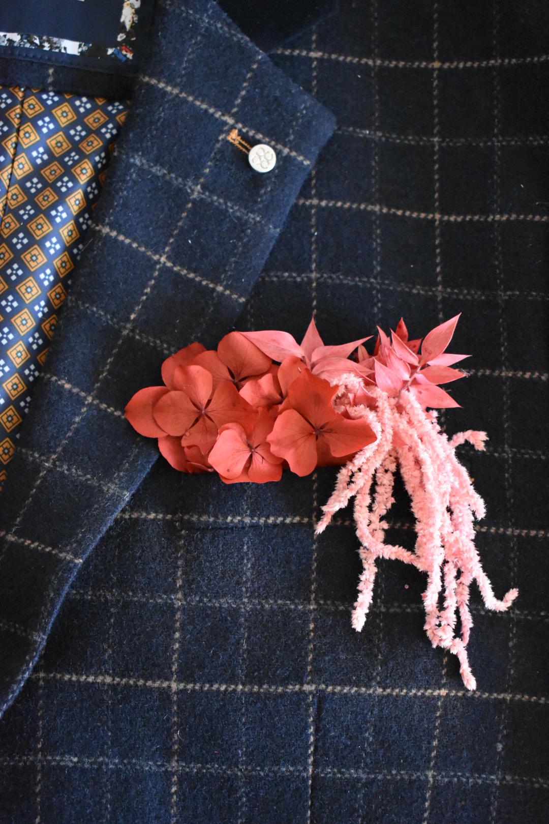 Red and pink pocket boutonniere