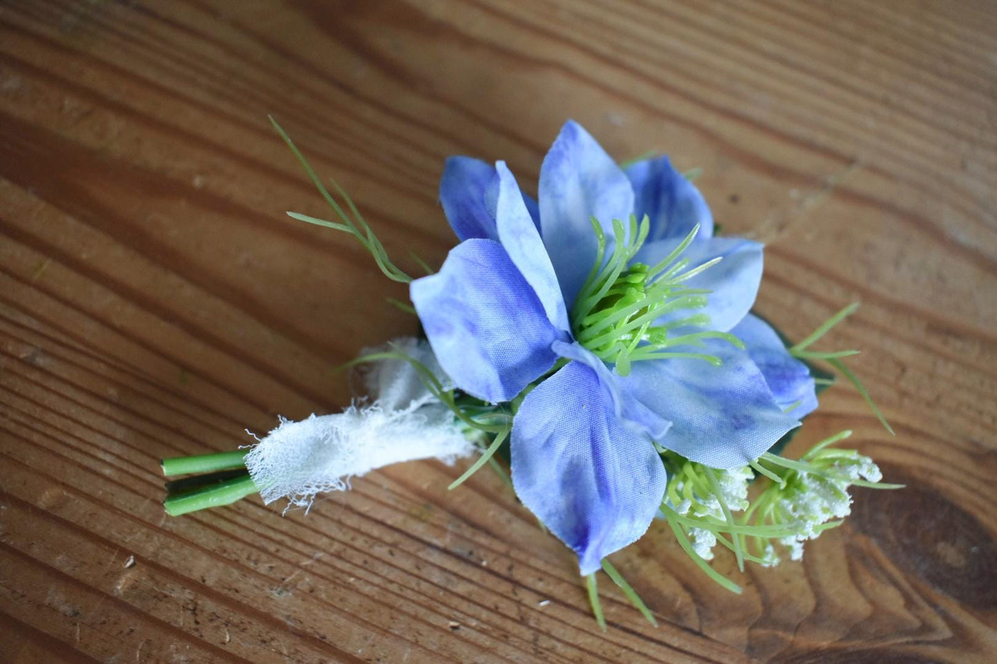 Blue nigella button hole
