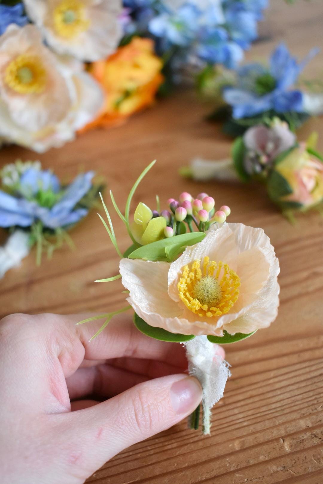 Peach poppy button hole