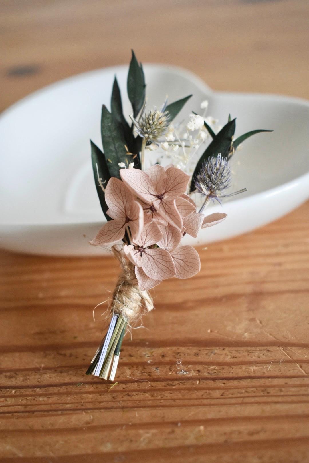 Petite hydrangea and thistle boutonniere
