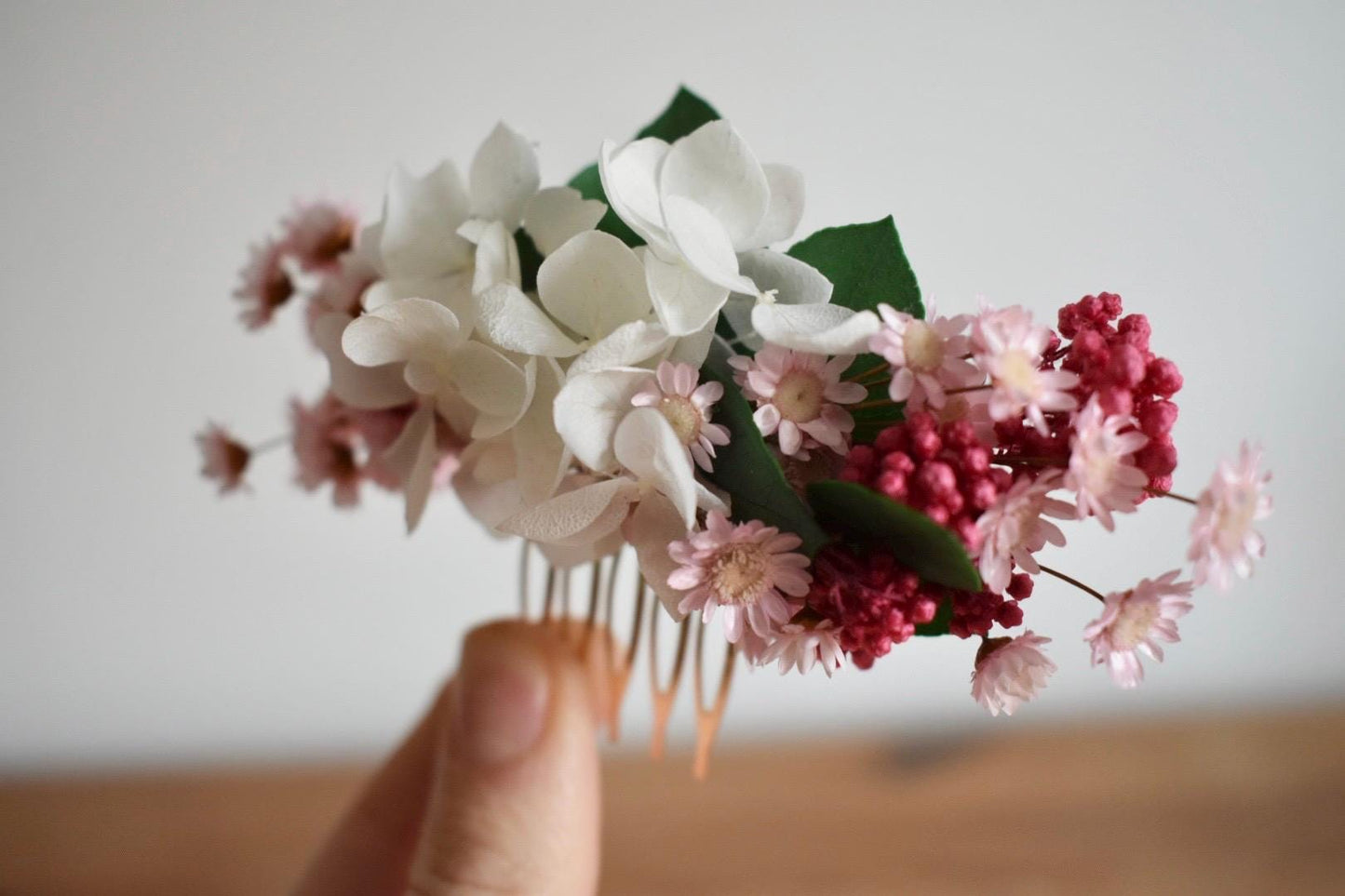 Pink and white floral hair comb