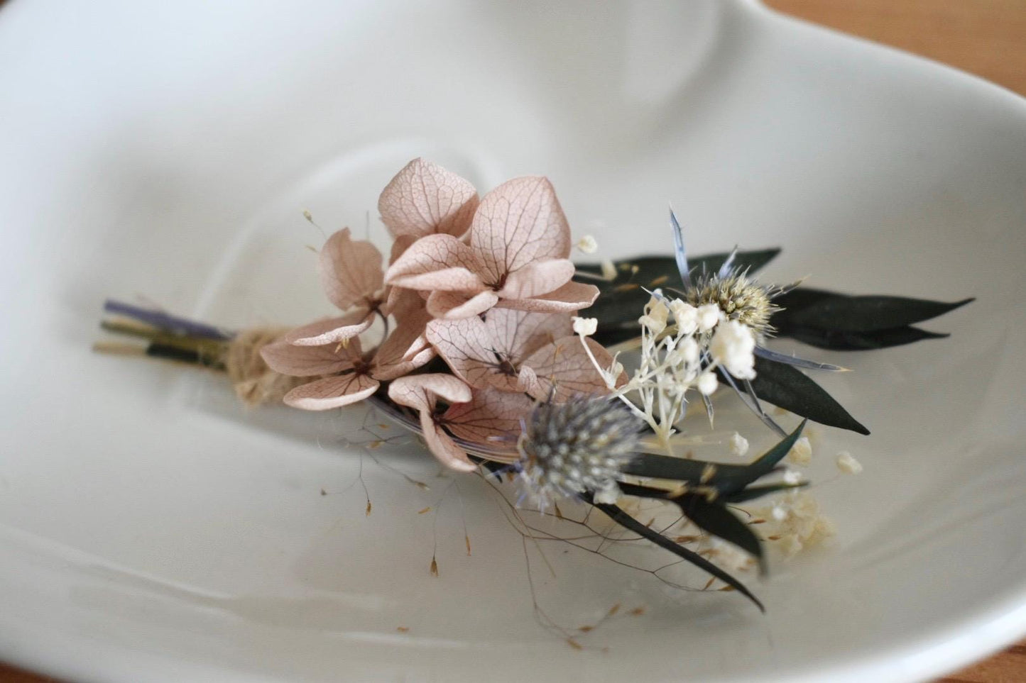 Petite hydrangea and thistle boutonniere