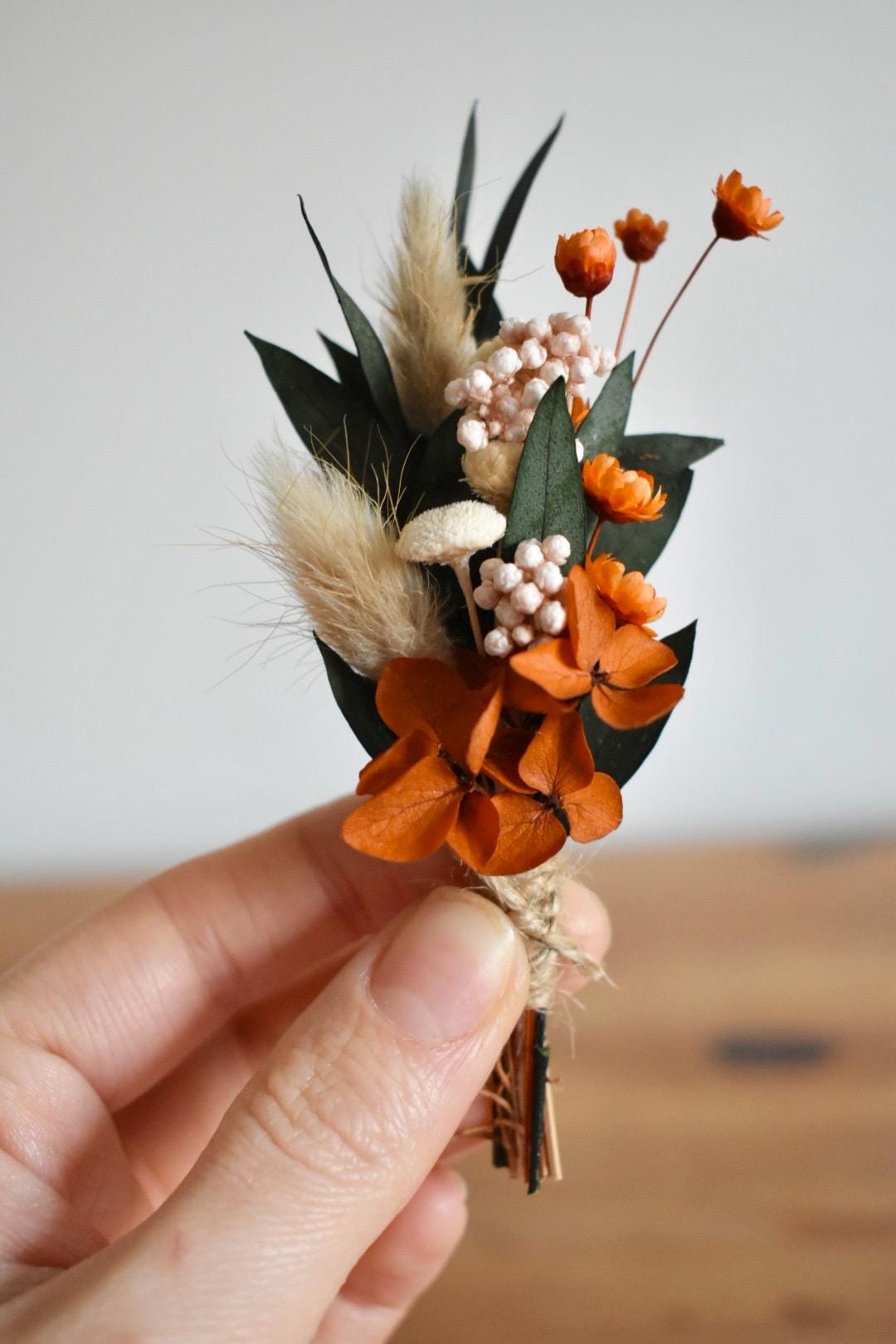 Orange hydrangea boutonniere