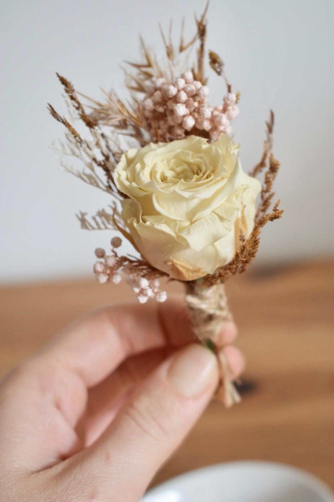Boho rose boutonniere