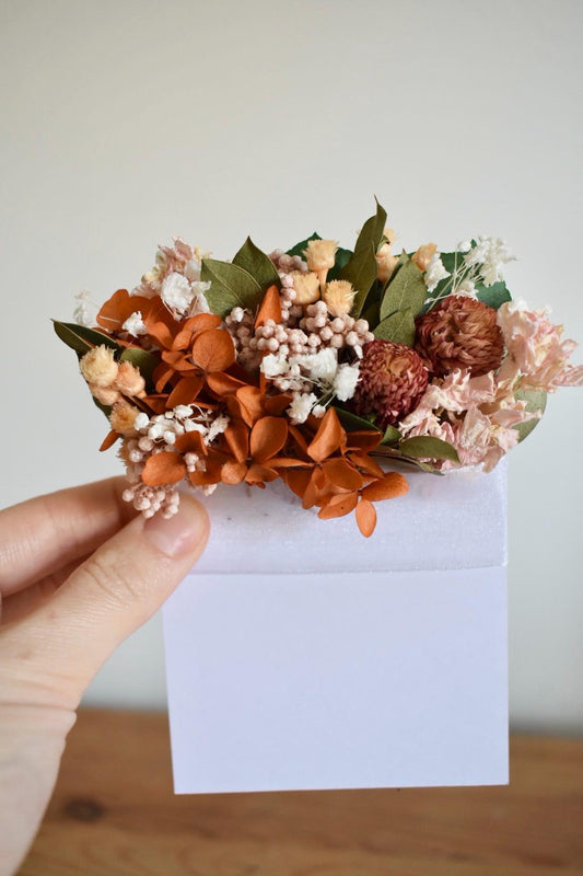 Orange and pink pocket boutonniere