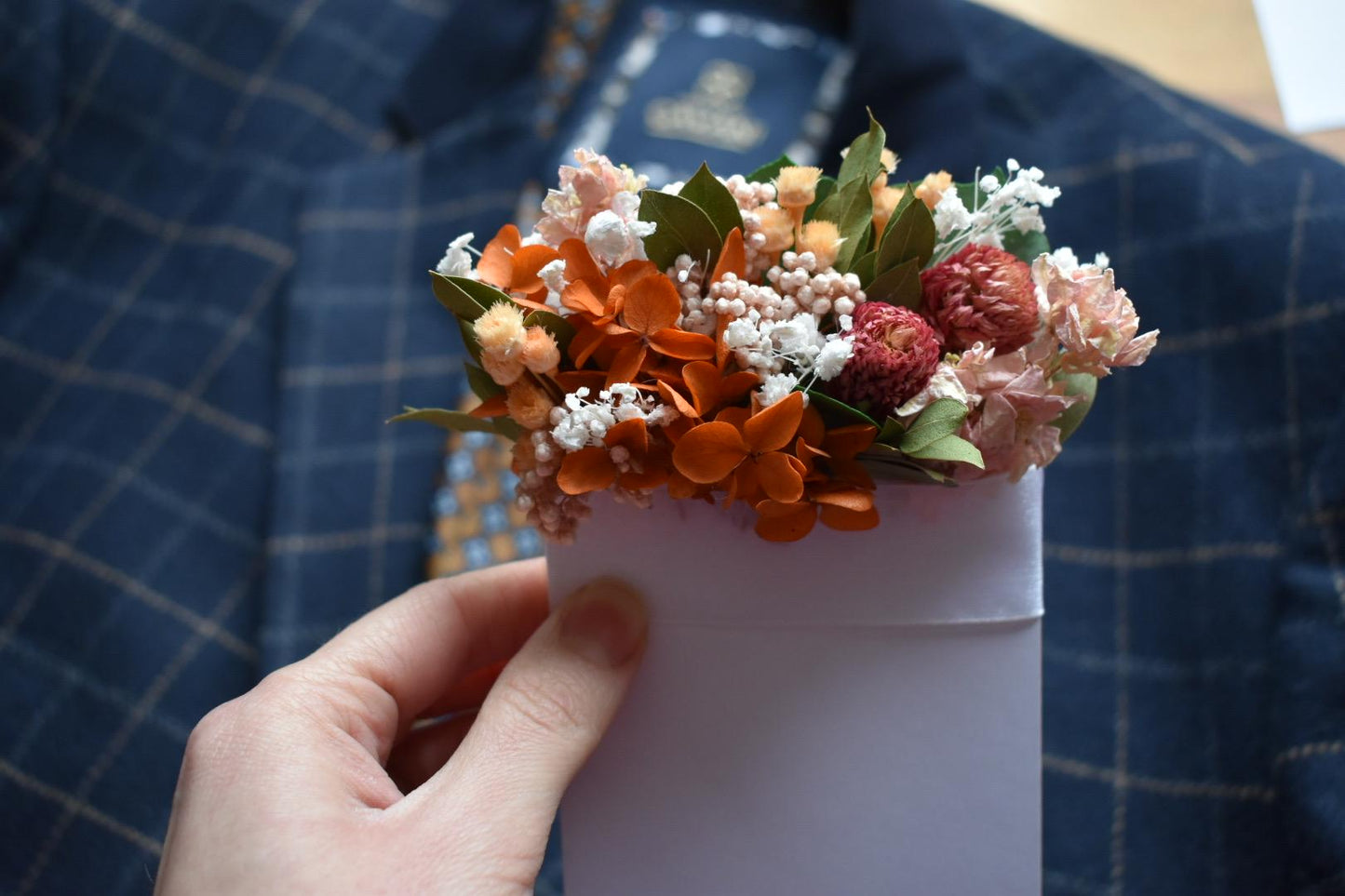 Orange and pink pocket boutonniere