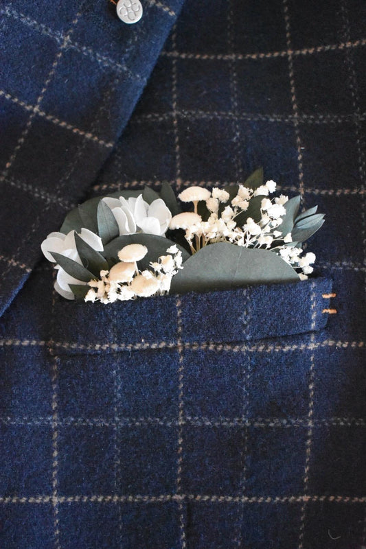 White hydrangea and eucalyptus pocket boutonniere