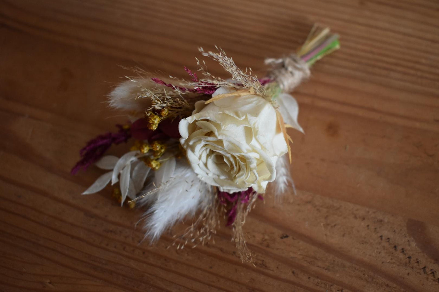 Deep and yellow boutonniere