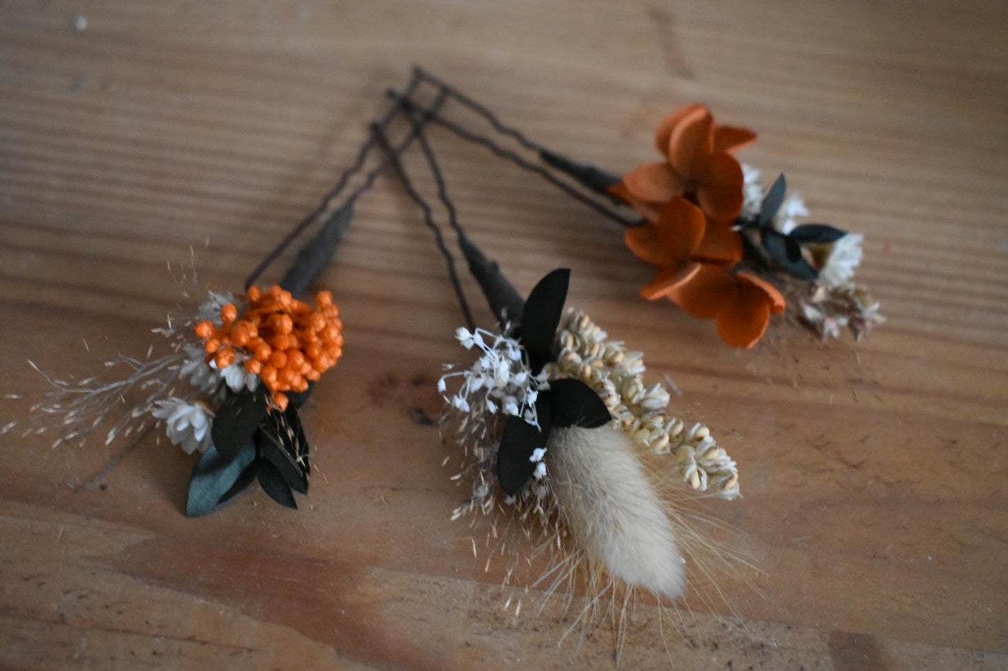 Orange flower hair pins