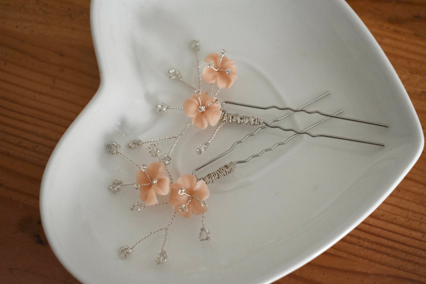Blush and silver hair pins