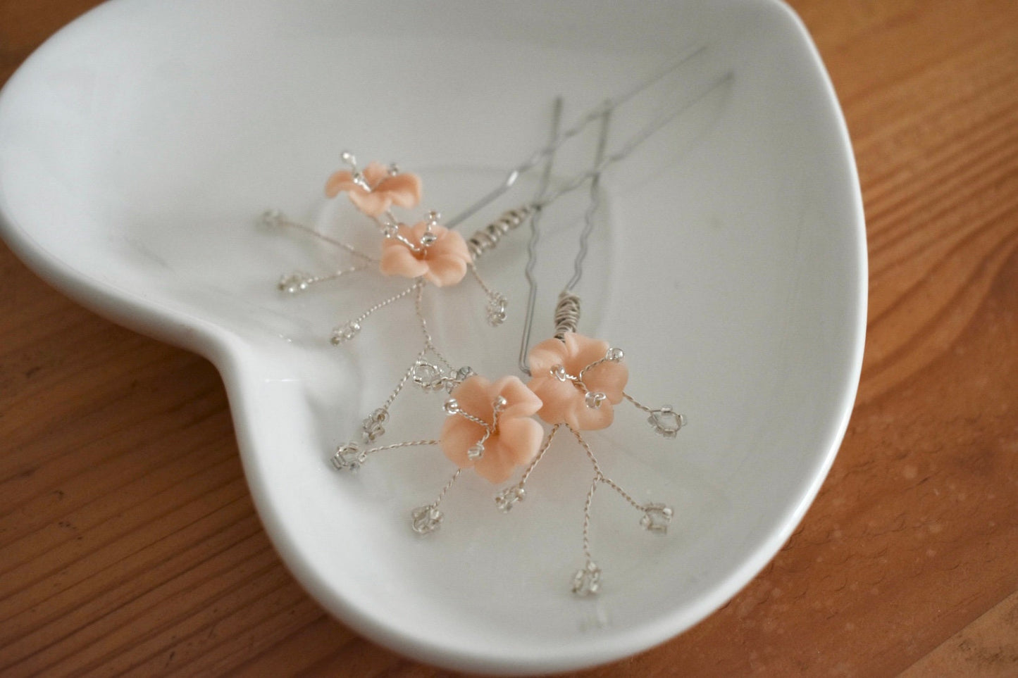Blush and silver hair pins