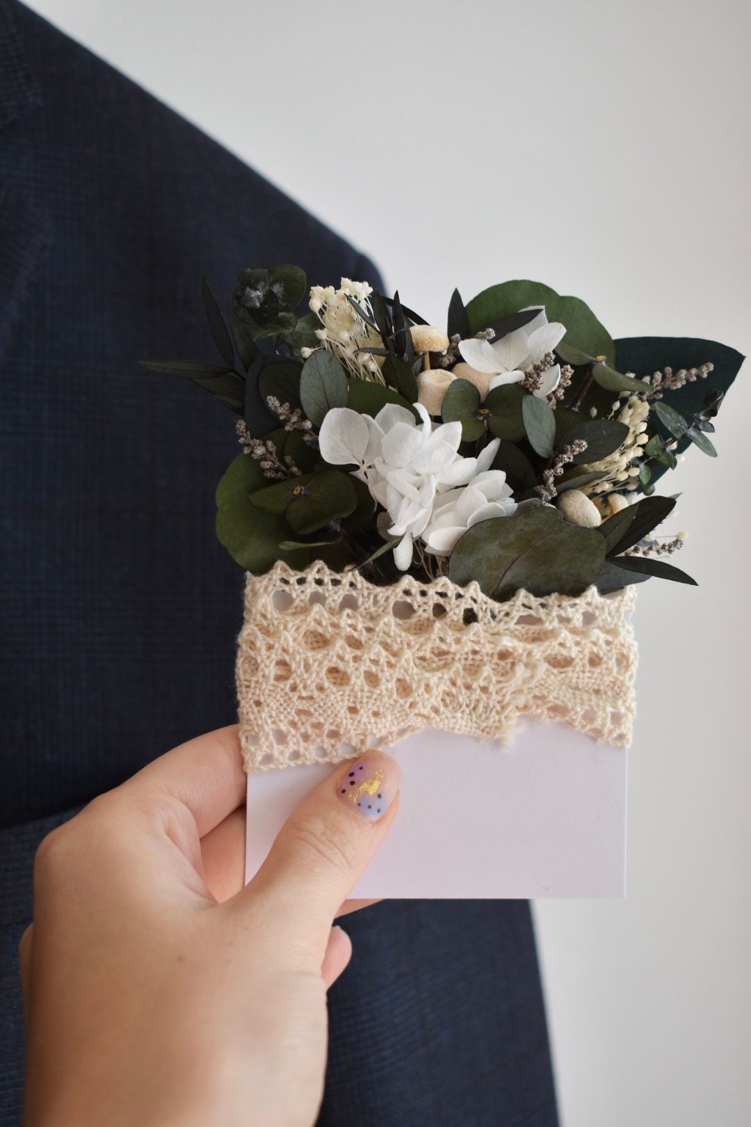 Hydrangea and eucalyptus pocket boutonniere