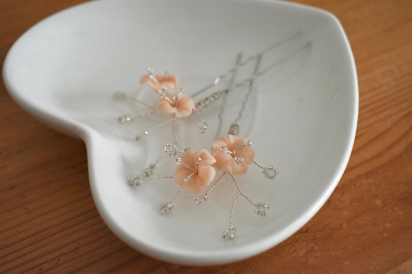 Blush and silver hair pins