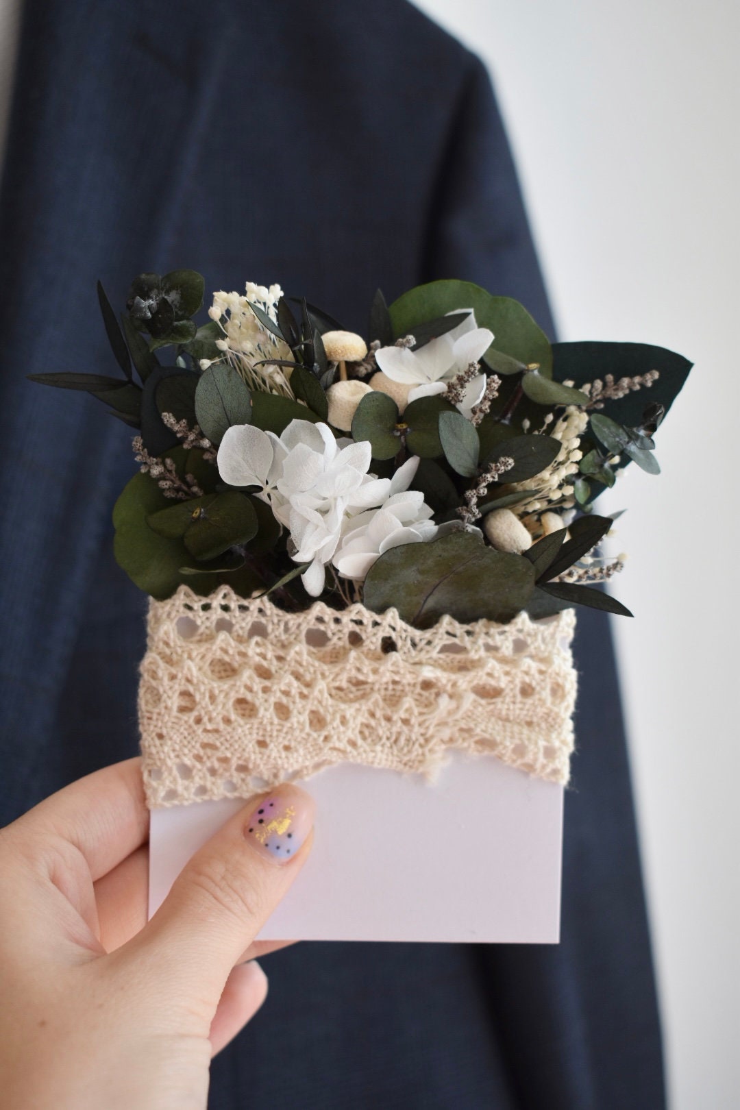Hydrangea and eucalyptus pocket boutonniere