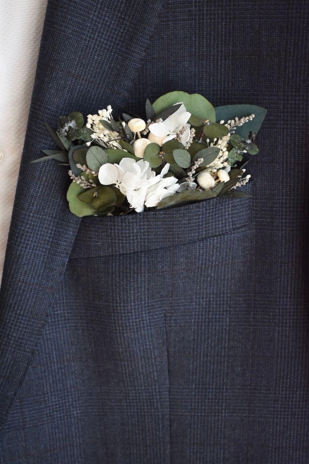 Hydrangea and eucalyptus pocket boutonniere