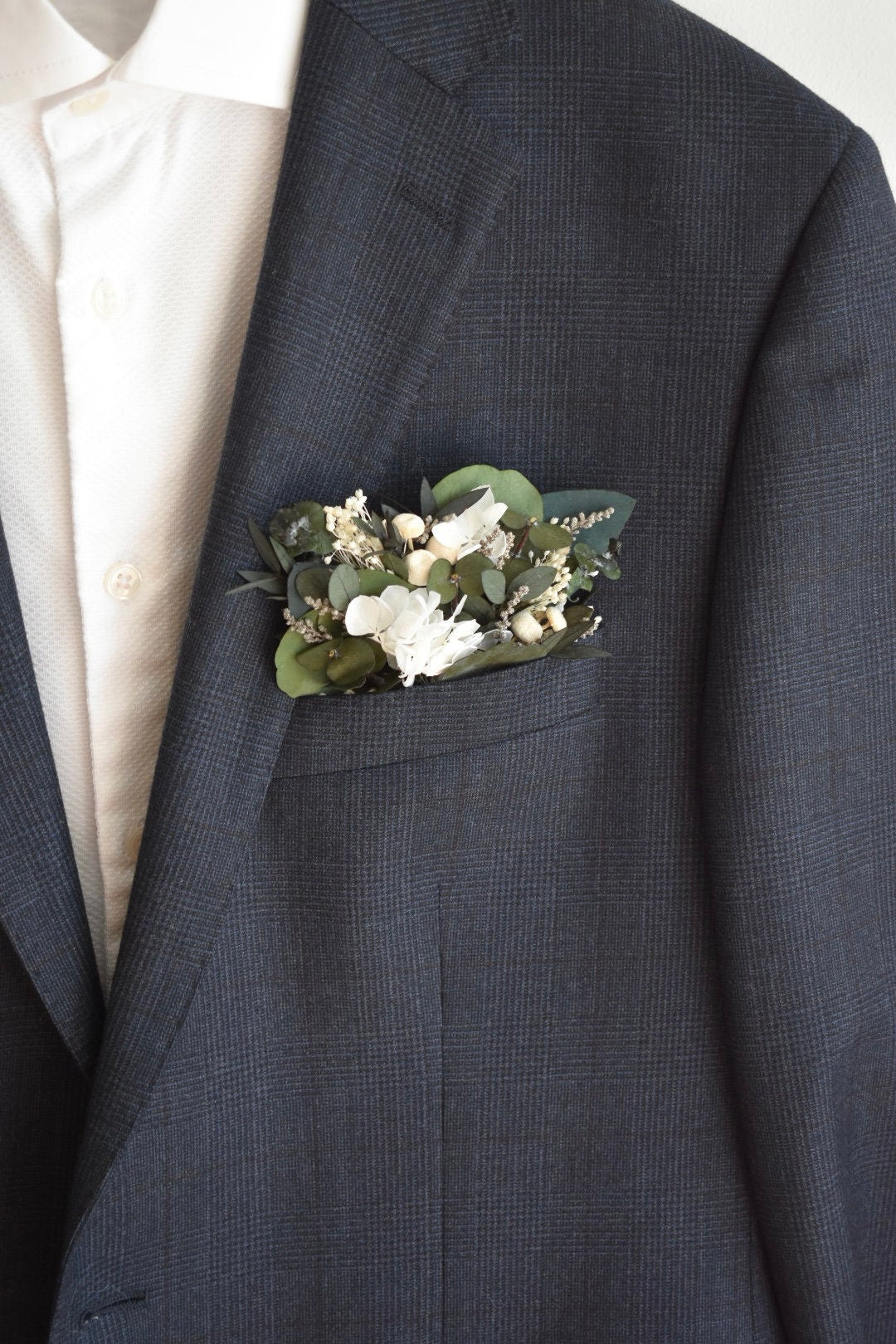 Hydrangea and eucalyptus pocket boutonniere