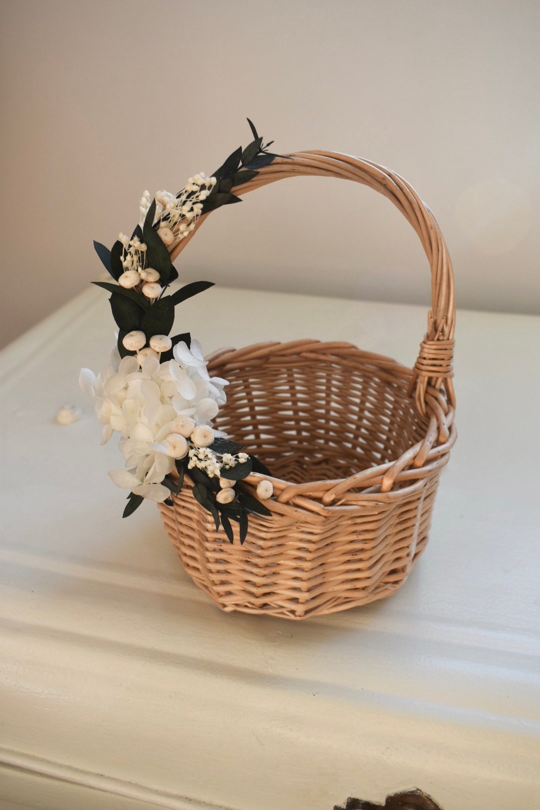 Bleached hydrangea and eucalyptus flower girl basket