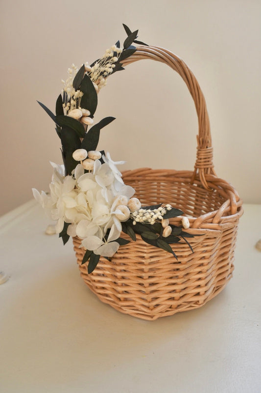 Bleached hydrangea and eucalyptus flower girl basket