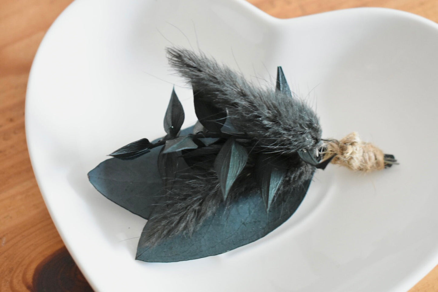 Dark foliage boutonniere
