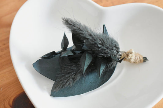 Dark foliage boutonniere