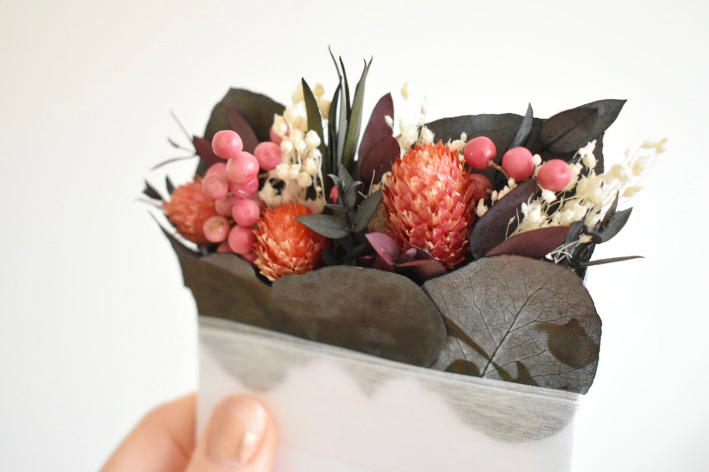 Pink berry pocket boutonniere