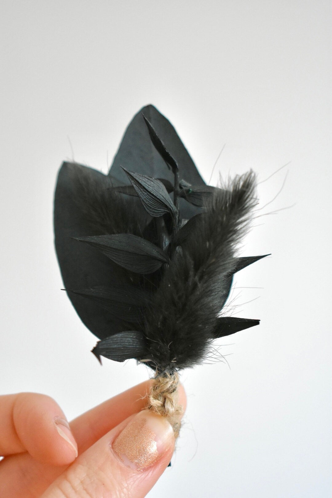 Dark foliage boutonniere