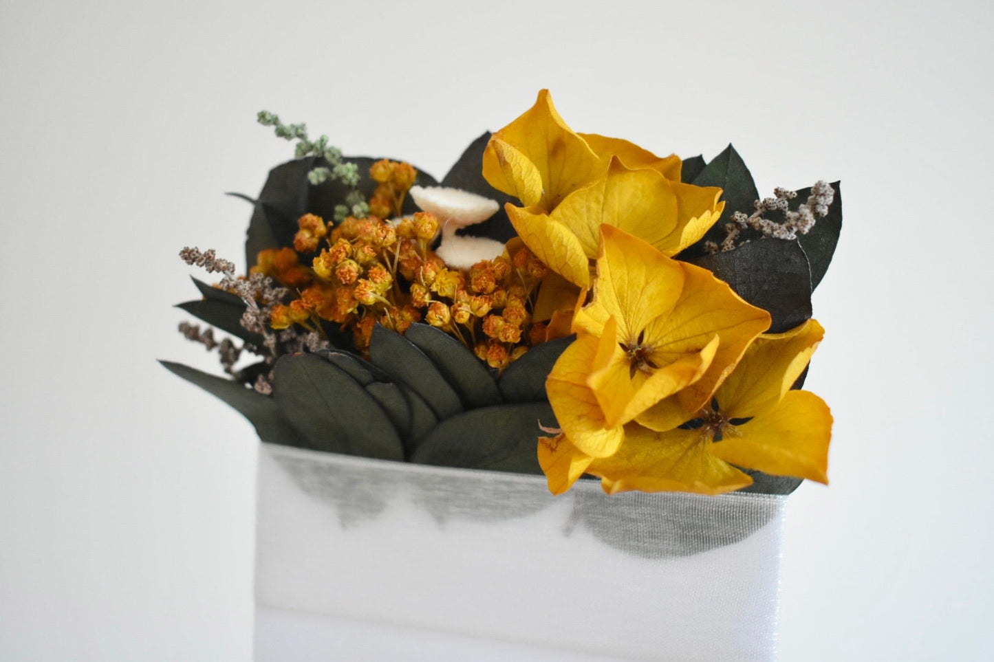 Yellow pocket boutonniere