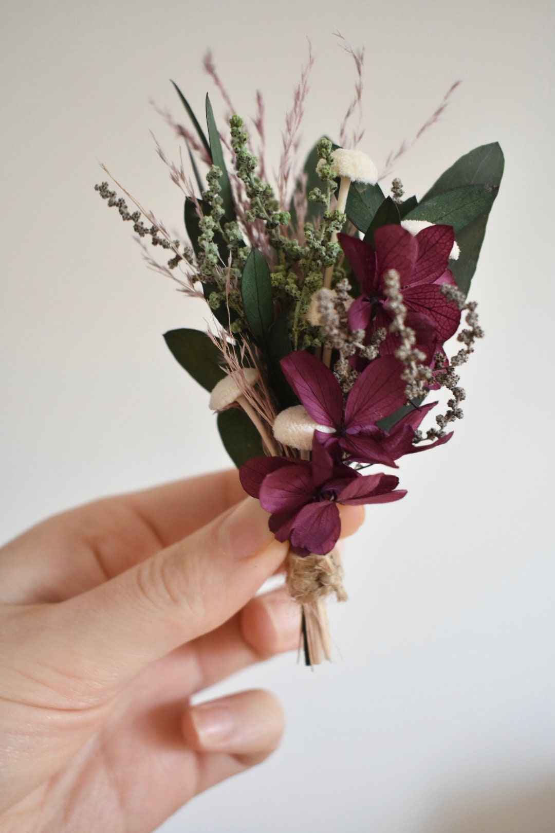 Hydrangea and foliage boutonniere
