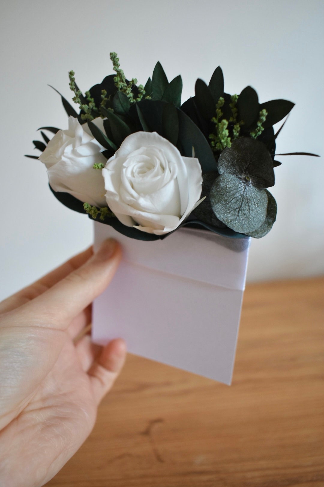 Pocket boutonniere with white roses
