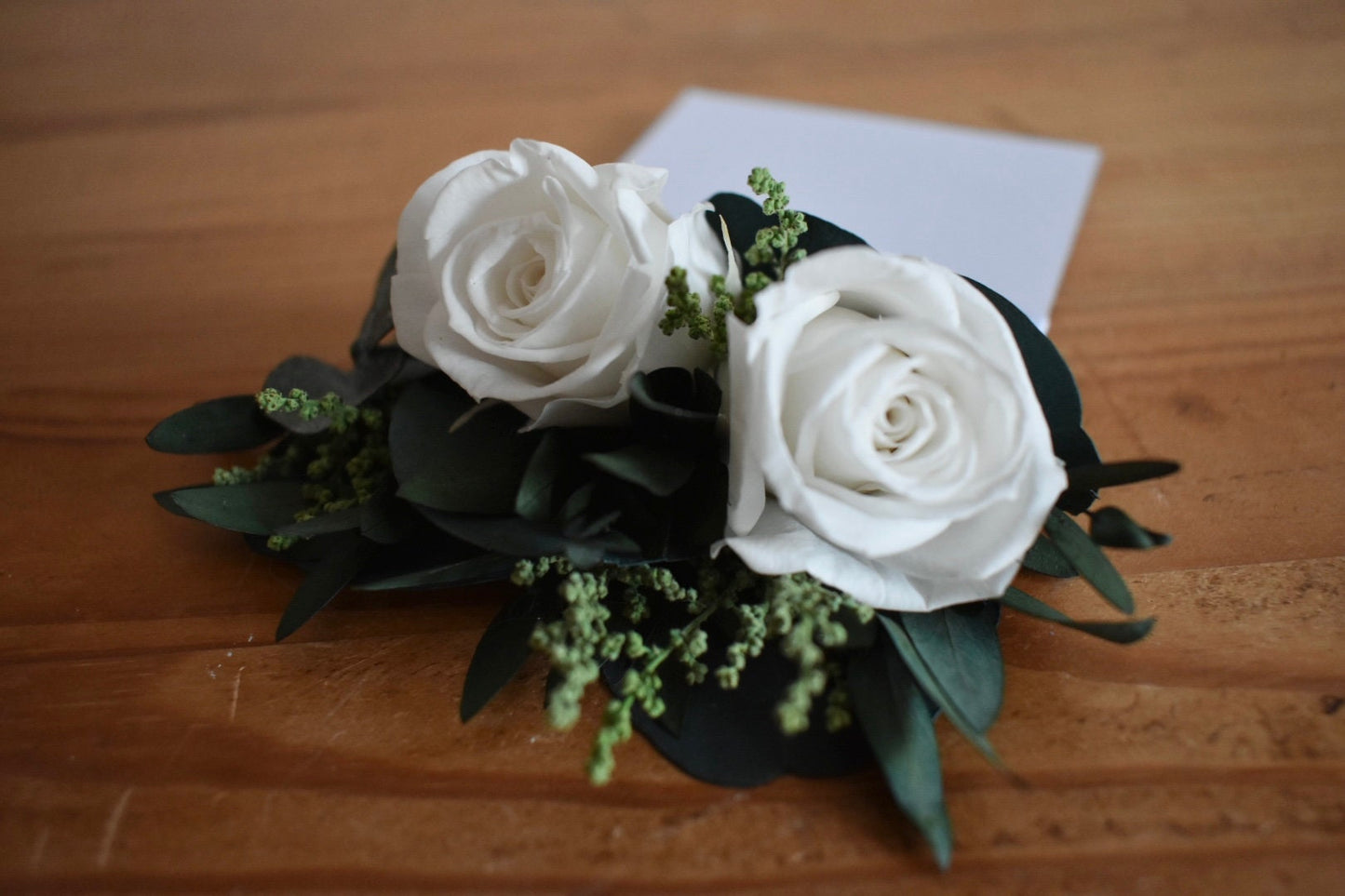 Pocket boutonniere with white roses