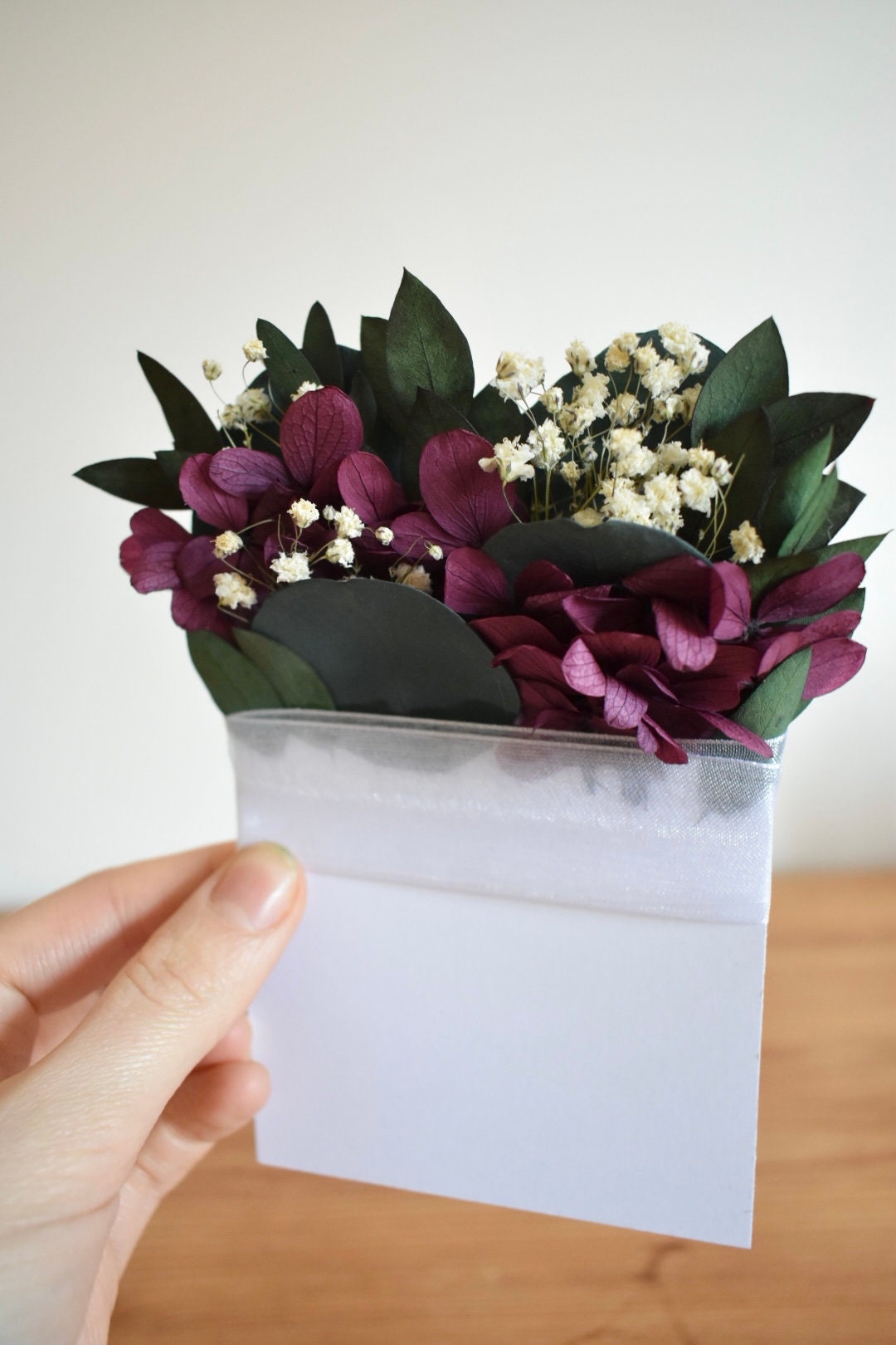 Eucalyptus, hydrangea and gypsophila pocket boutonniere