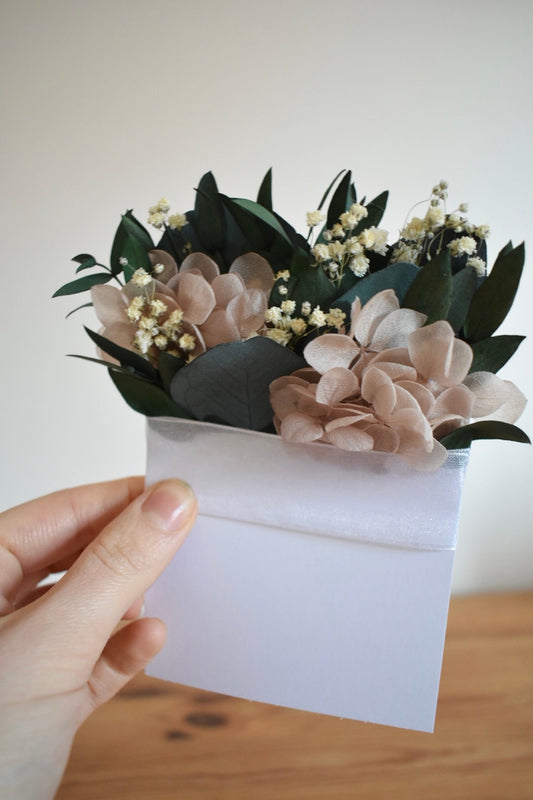 Eucalyptus, nude hydrangea and gypsophila pocket boutonniere
