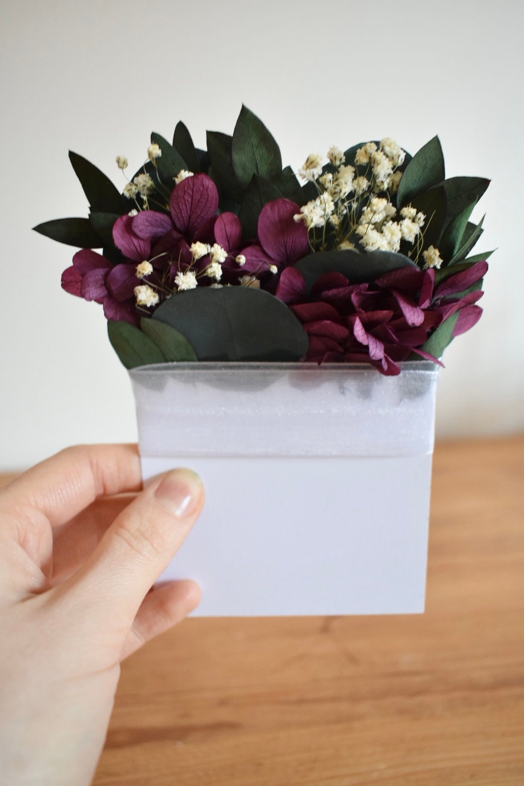 Eucalyptus, hydrangea and gypsophila pocket boutonniere