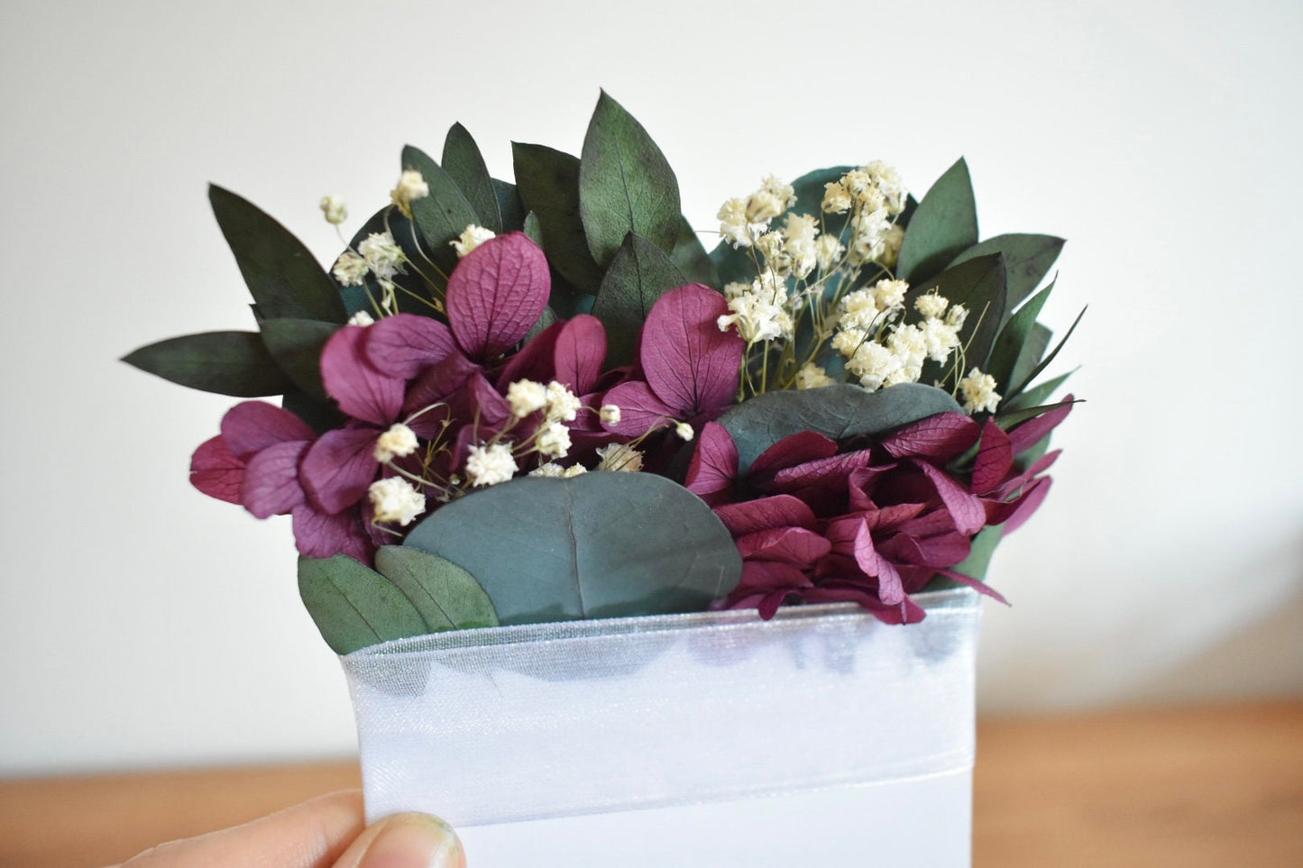 Eucalyptus, hydrangea and gypsophila pocket boutonniere