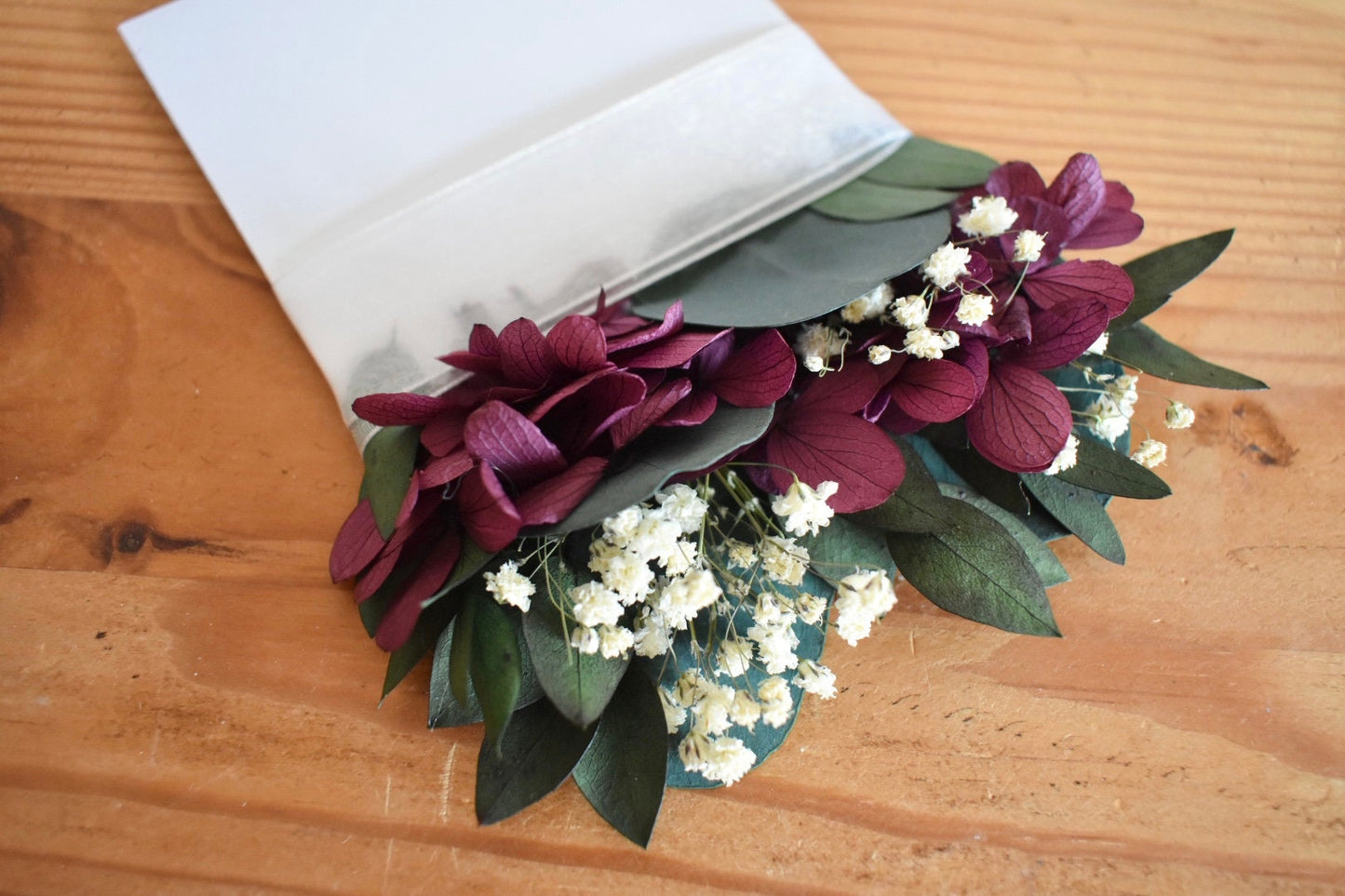 Eucalyptus, hydrangea and gypsophila pocket boutonniere