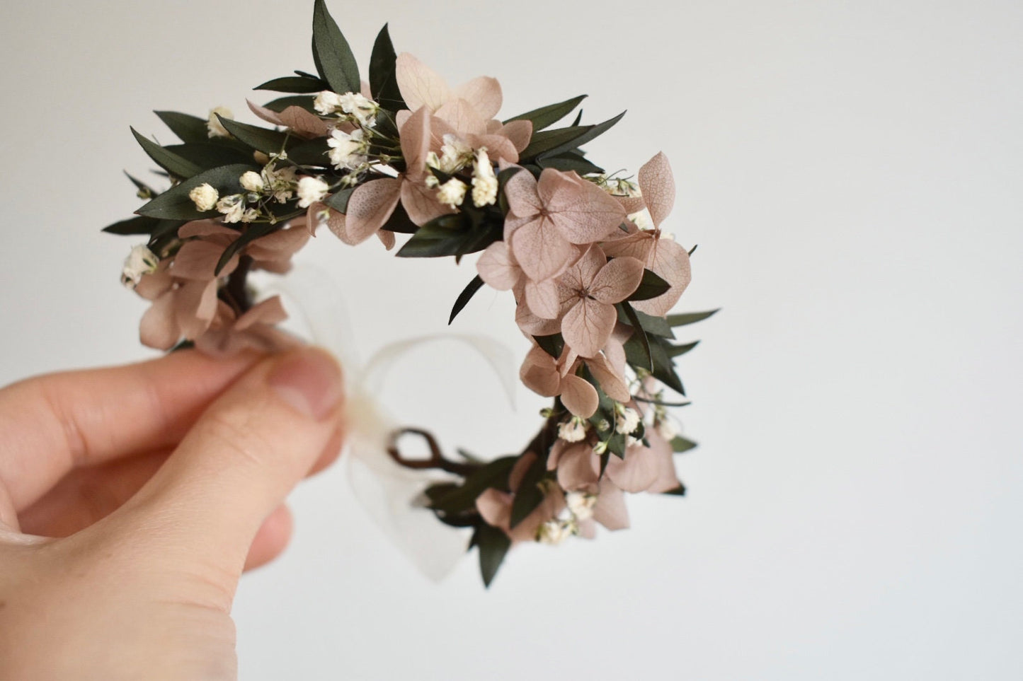 Nude hydrangea, eucalyptus and gypsophila wrist corsage