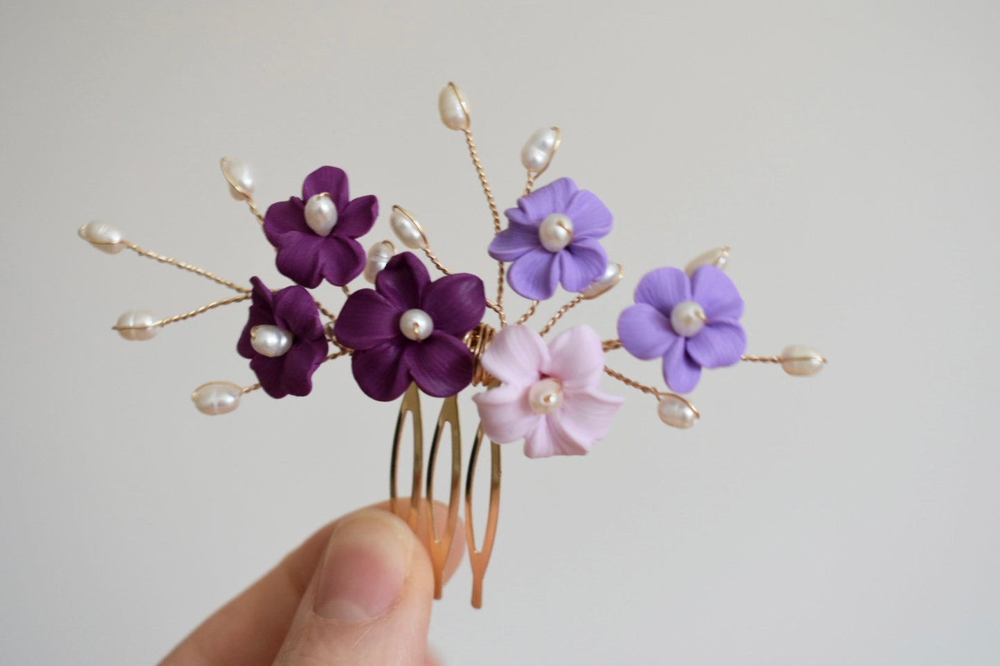 Pink and purple flower comb