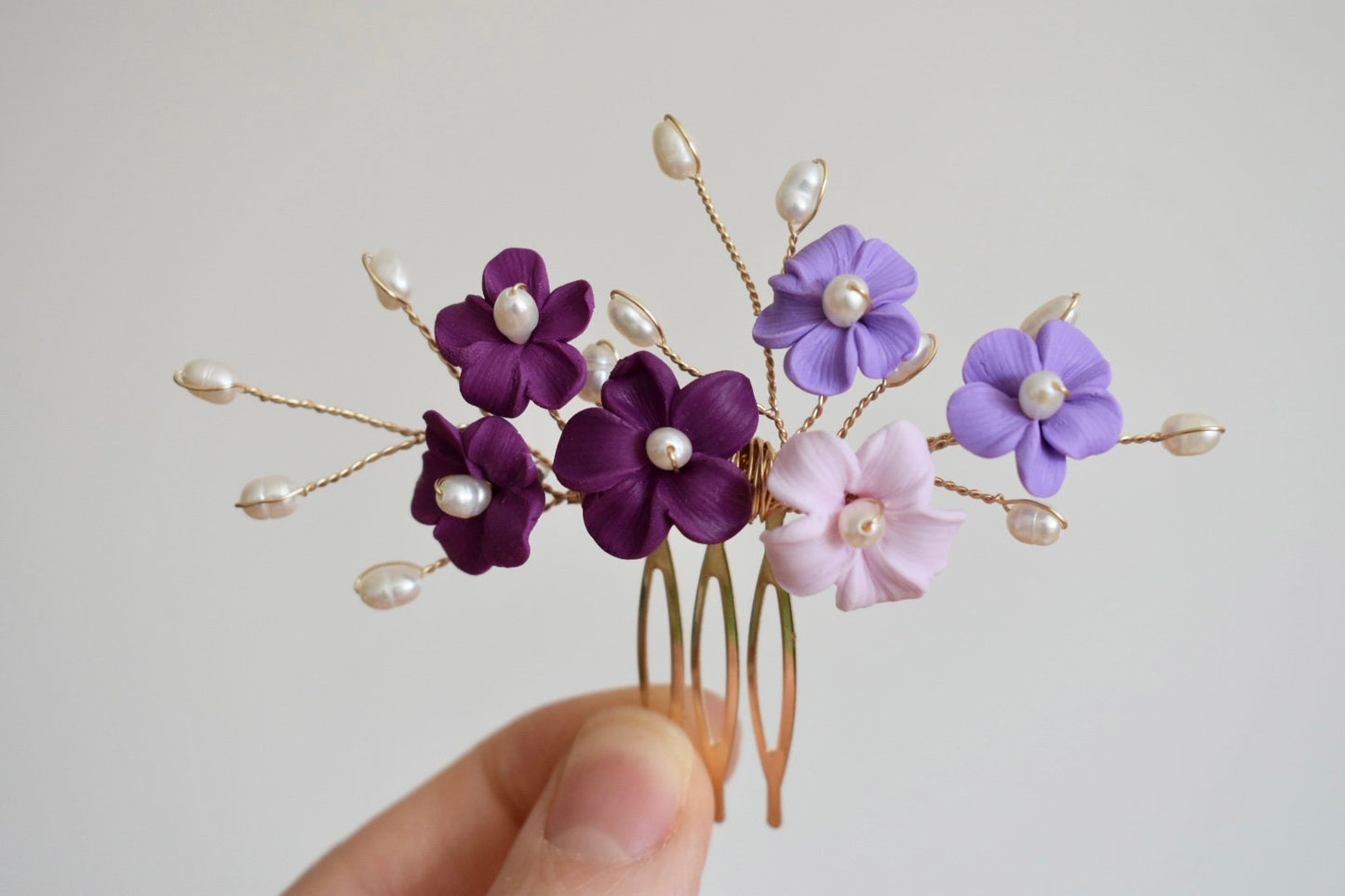 Pink and purple flower comb