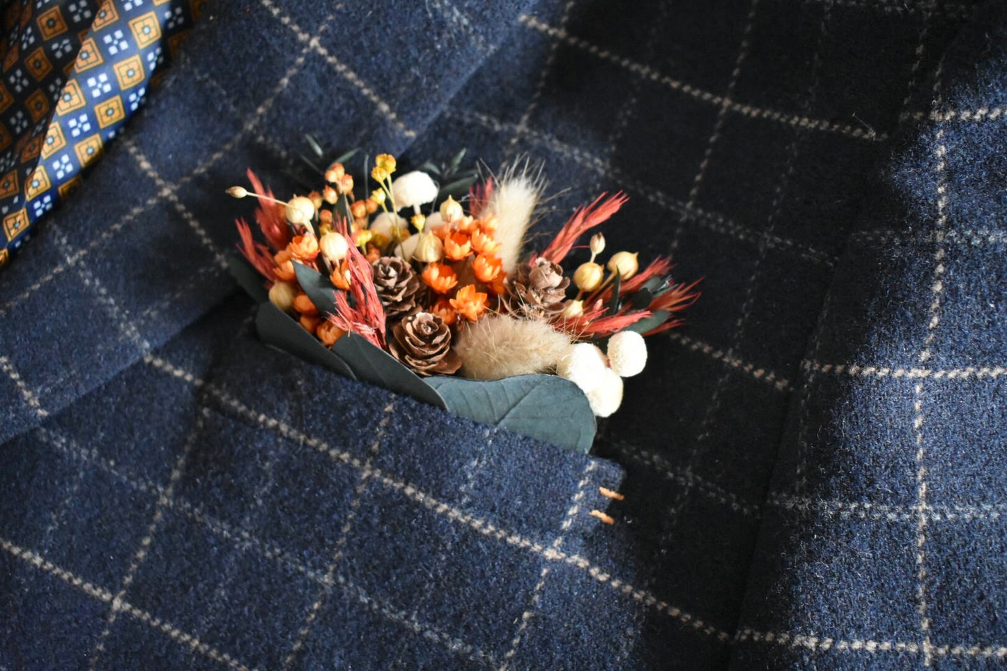 Mixed autumn flowers pocket boutonniere