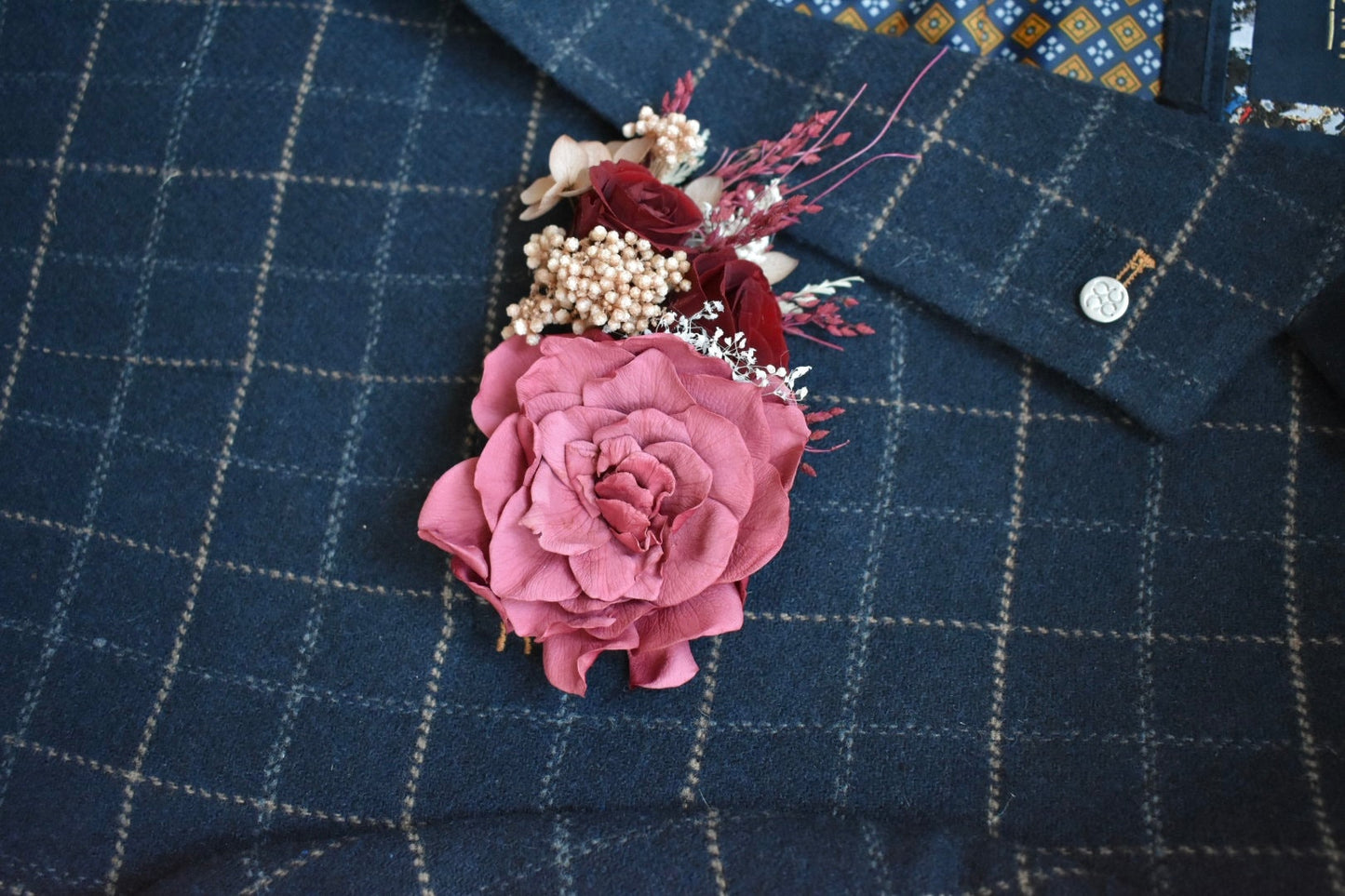 Nude, blush and red statement pocket boutonniere