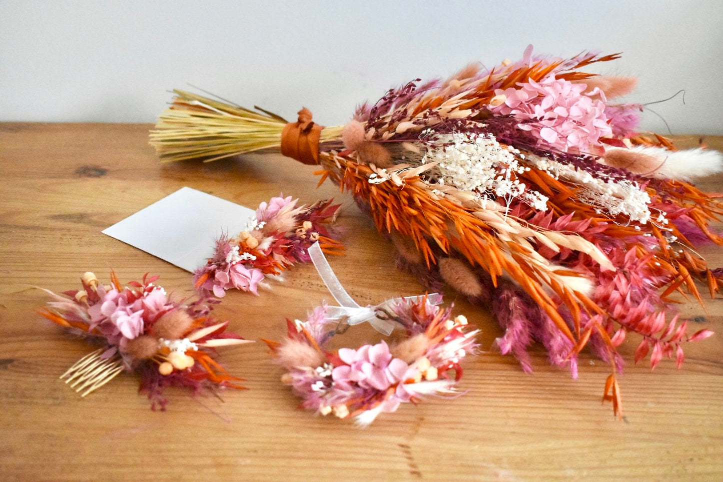 Pink and orange bright dried flower bouquet