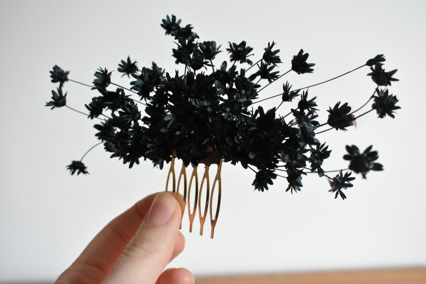 Black dried flower comb