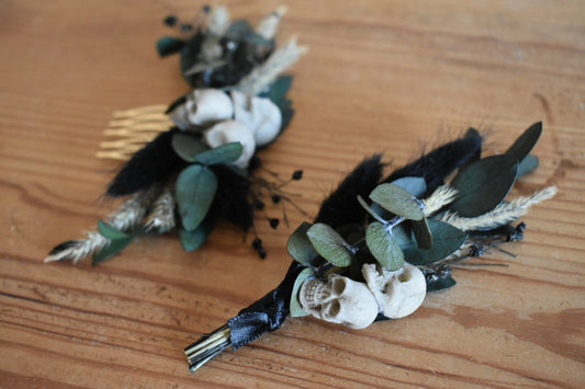 Black dried foliage boutonniere with mini faux skulls