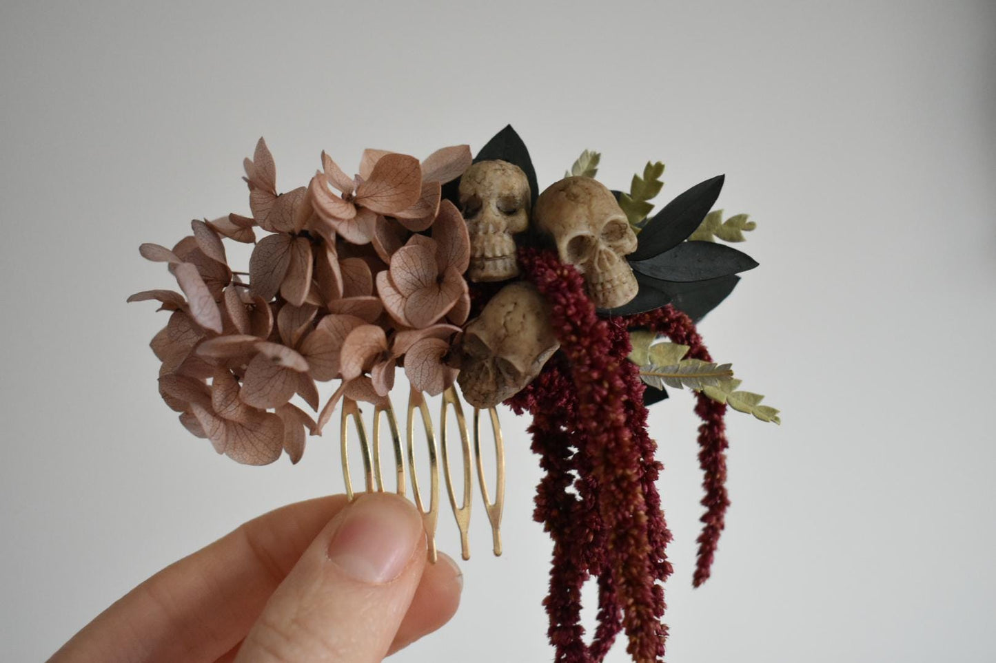 Floral comb with mini faux skulls