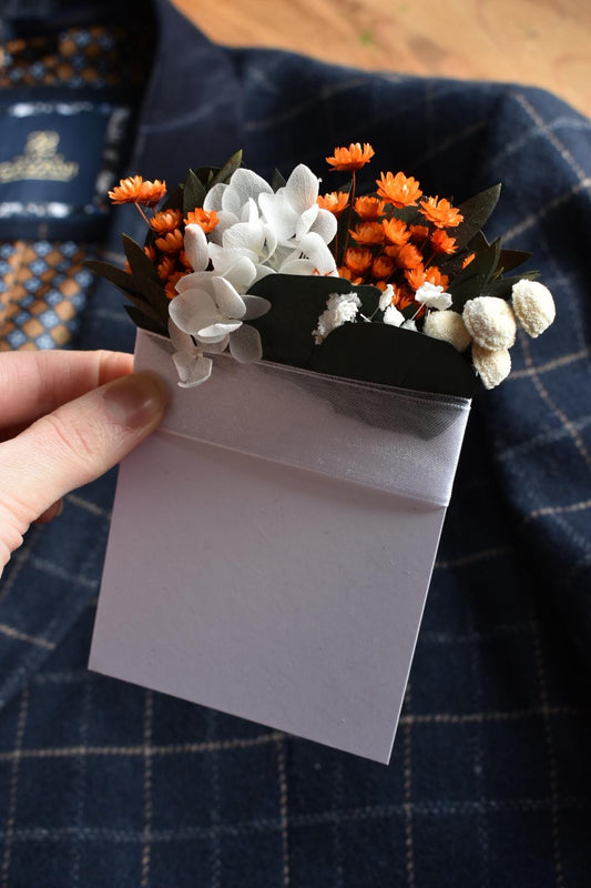 Orange pocket boutonniere