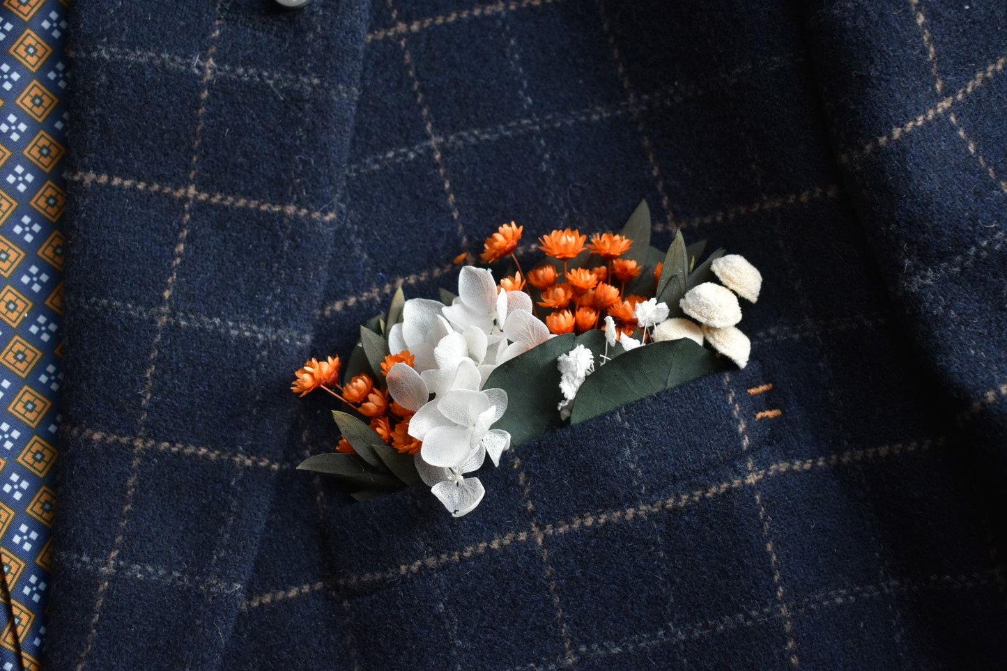 Orange pocket boutonniere