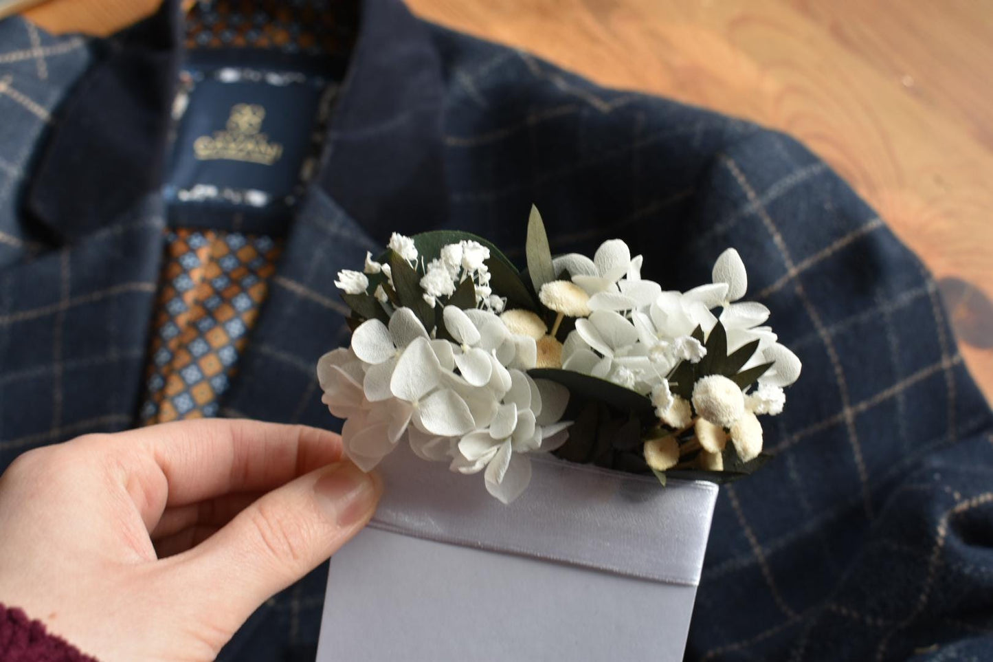 White hydrangea pocket boutonniere